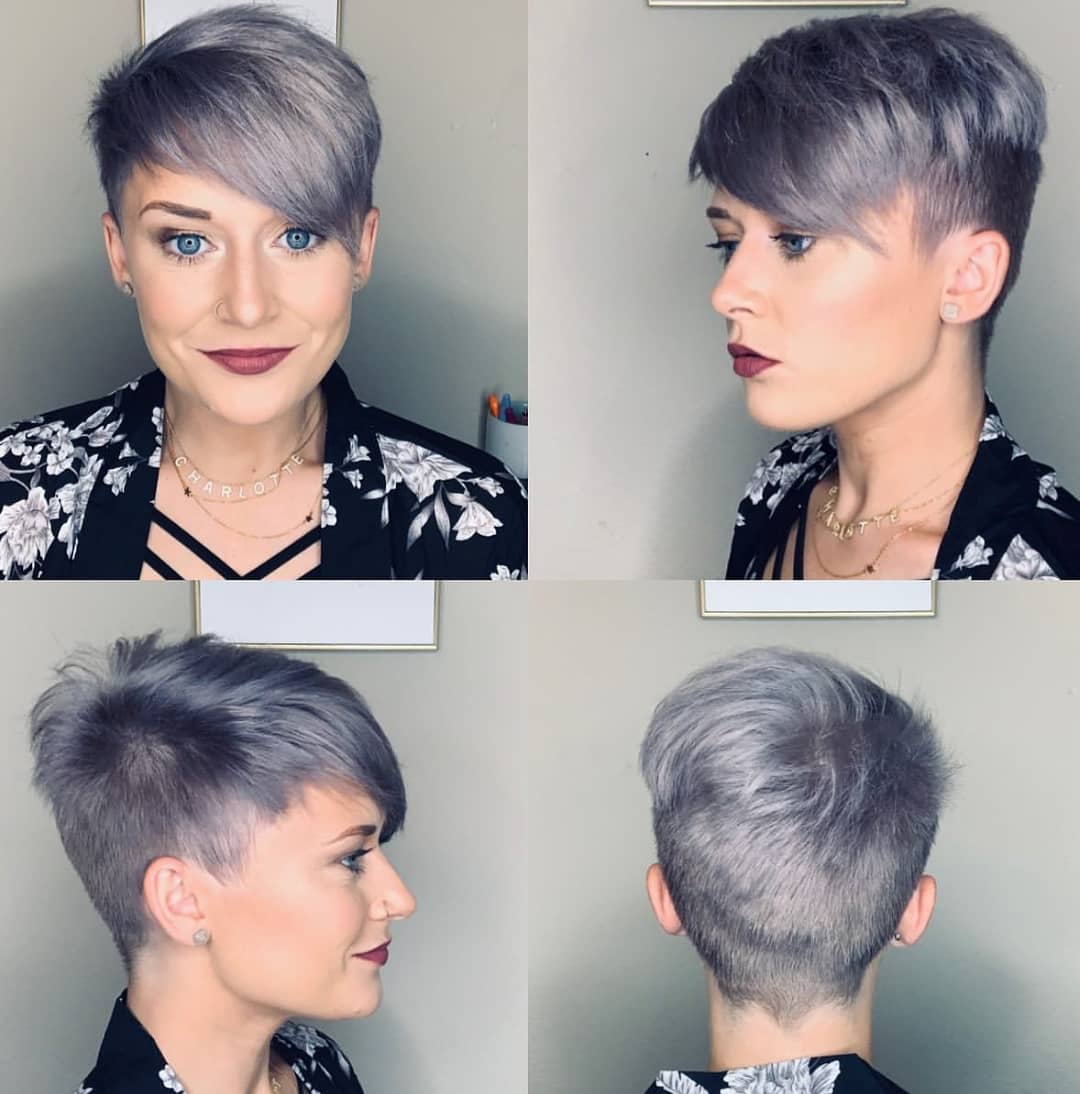 Pixie cut corto grigio scuro con ciuffo asimmetrico sulla fronte