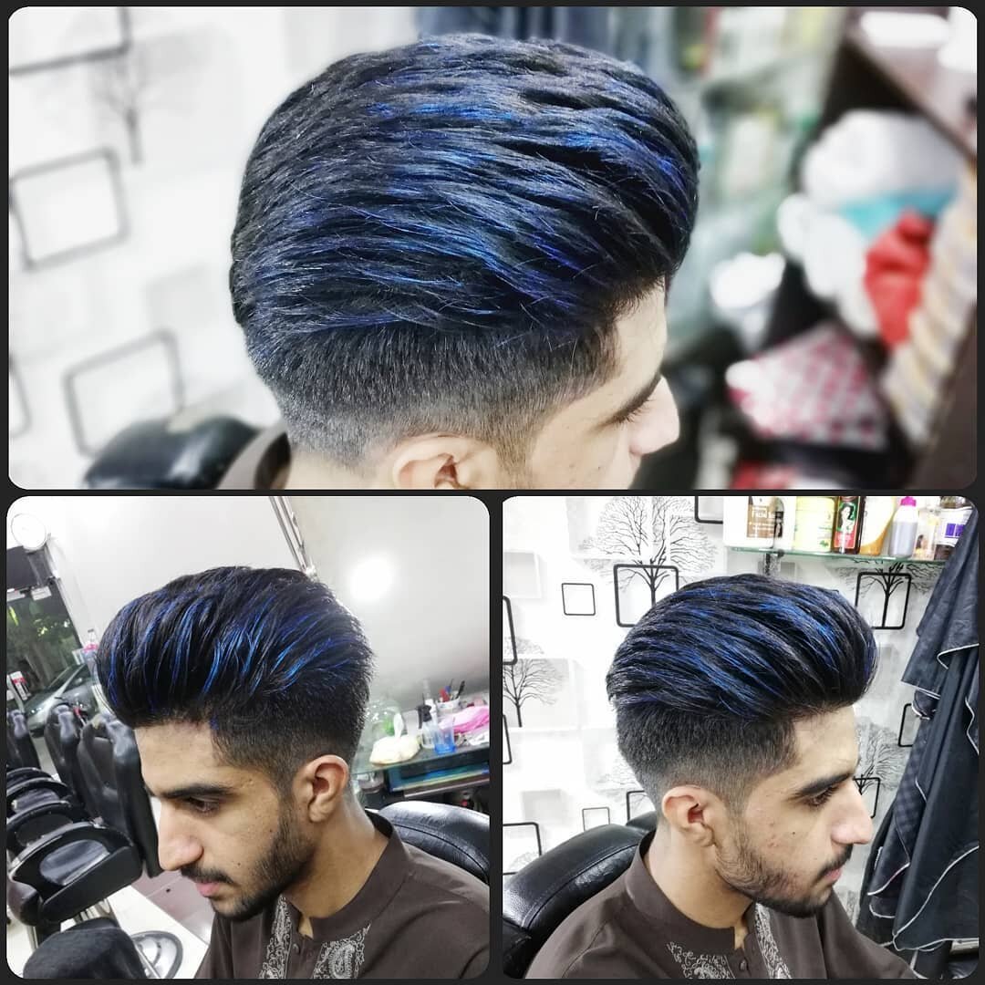 Riflessi blu su capelli scuri, uomo