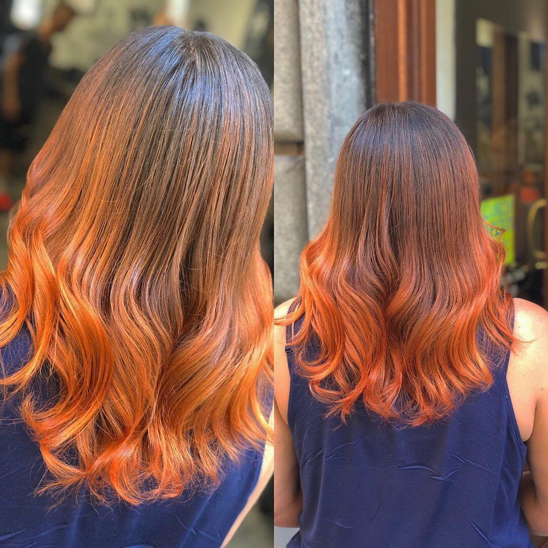 Shatush rosso rame su capelli lunghi e mossi